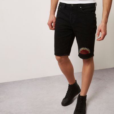 Black slim cut sun embroidered shorts